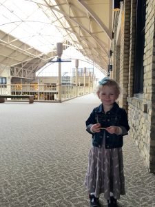 Our darling Eloise holding the keys to our new office.